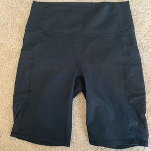 Fabletics black biker shorts with side pockets